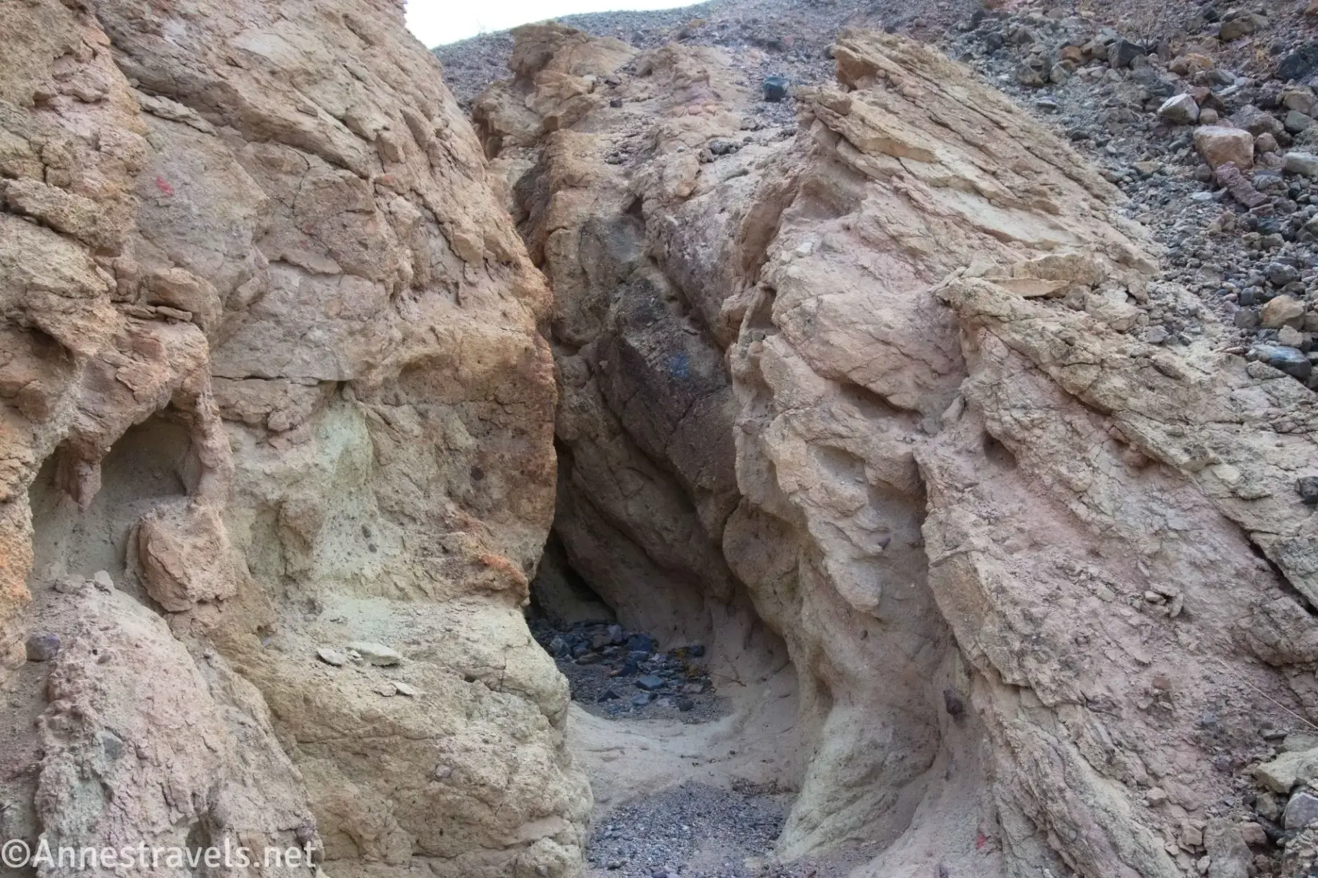 Tight Slot Fork Rocks forming a slot canyon in a gravelly hillside