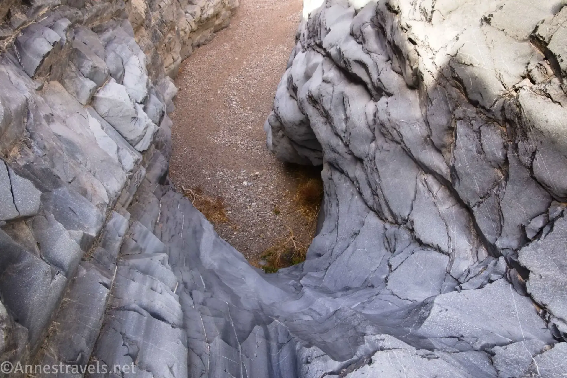 Looking Down a Dryfall Gray dryfall to a gravel wash