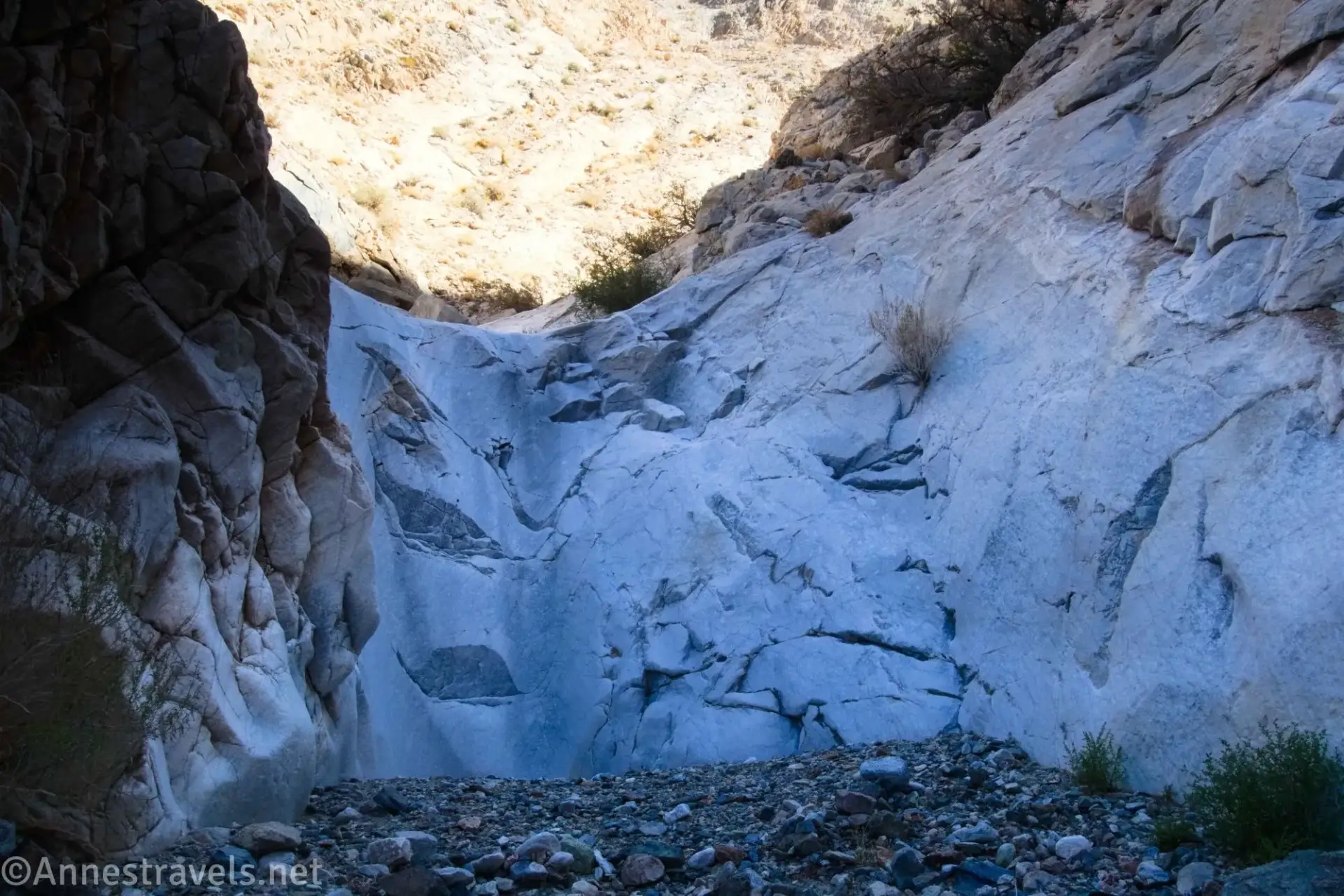 An early dryfall A gray dryfall in a desert canyon