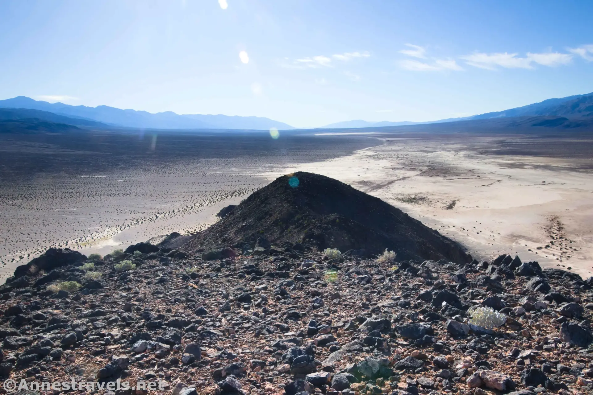 Views South from Lake Hill A rocky hilltop gives way to views of playa and distant hazy mountains