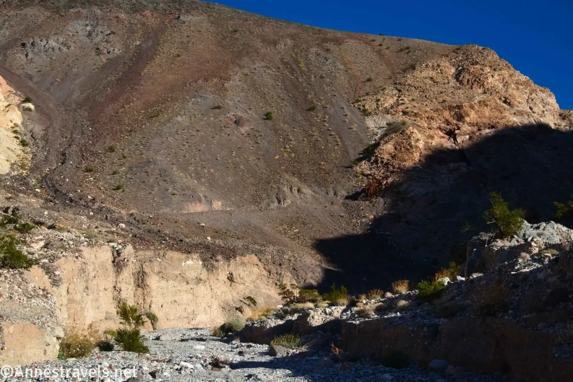 Wash Below the Big 4 Mine A rugged desert hillside above a rocky wash