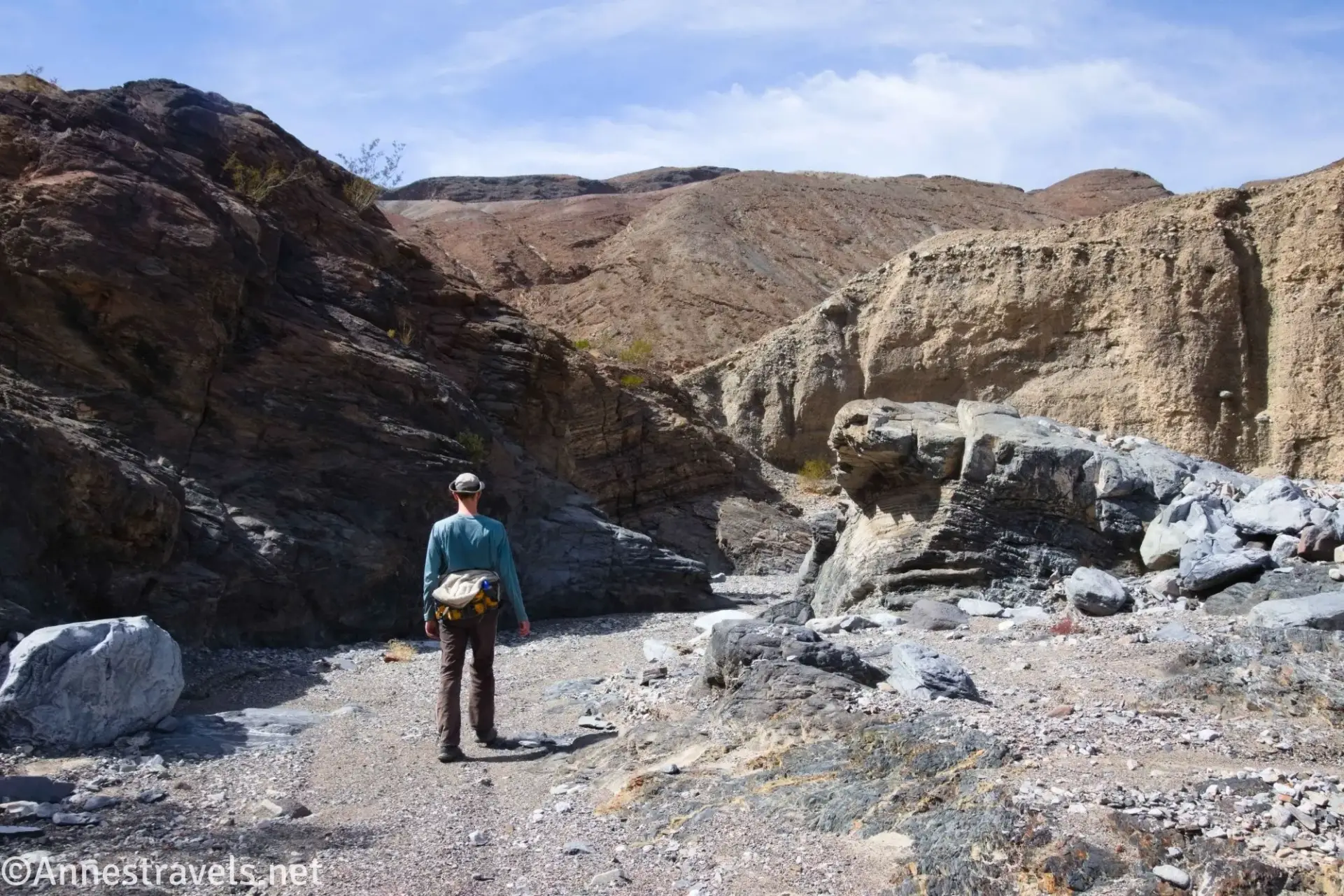 Hiker in Middle Corridor Canyon Hills and rocks around Corridor Canyon