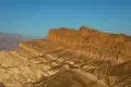 Striped badlands below the Red Cathedral Canyon Crest from Zabriskie Point in Death Valley National Park
