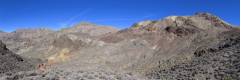 Mountains above Sheep Canyon Colorful red, yellow, and brown mountains rise from a sagebrush valley