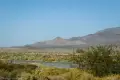 Desert mountains and a blacktop road