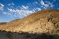 Rock layers in a hillside above Rainbow Canyon