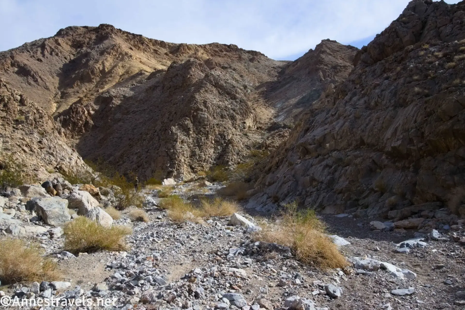 Brush and gravel in upper Corridor Canyon below brown hills