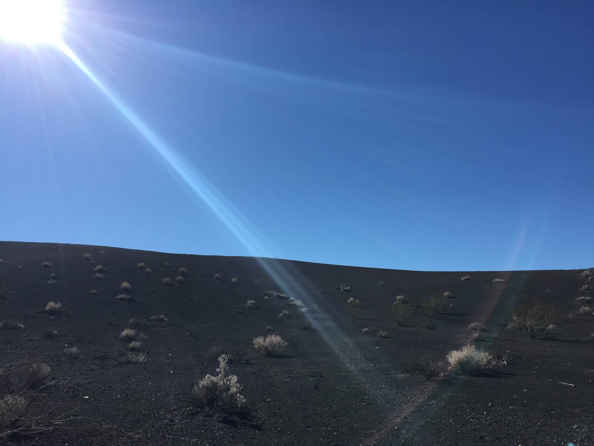 Looking up at the rim of Ubehebe Crater, Death Valley National Park, California
