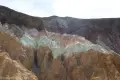 Colors in the South Fork of Desolation Canyon Colorful badland hills in front of a gravelly hill
