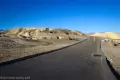 Wide paved path leading to the top of a badland hill known asZabriskie Point, Death Valley National Park, California