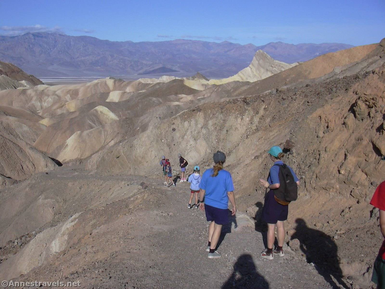 Hikers on the upper Badlands Trail, Death Valley National Park, California