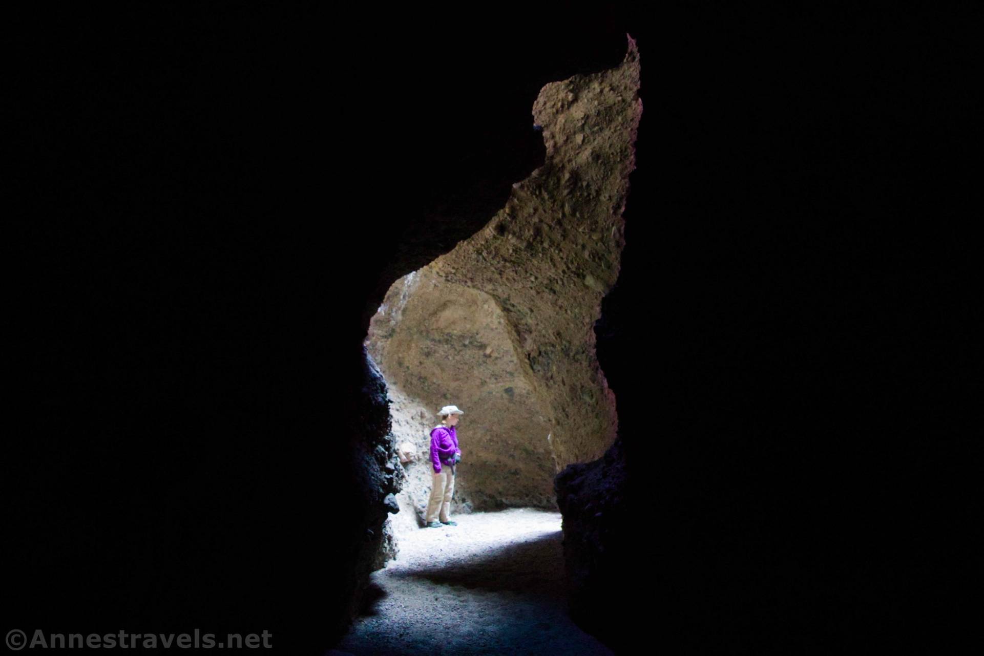 In a dark section of Sidewinder Canyon Slot 4, Death Valley National Park, California