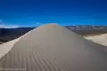 Highest Dune Ripples on the crest of a sand dune with distant mountains visible