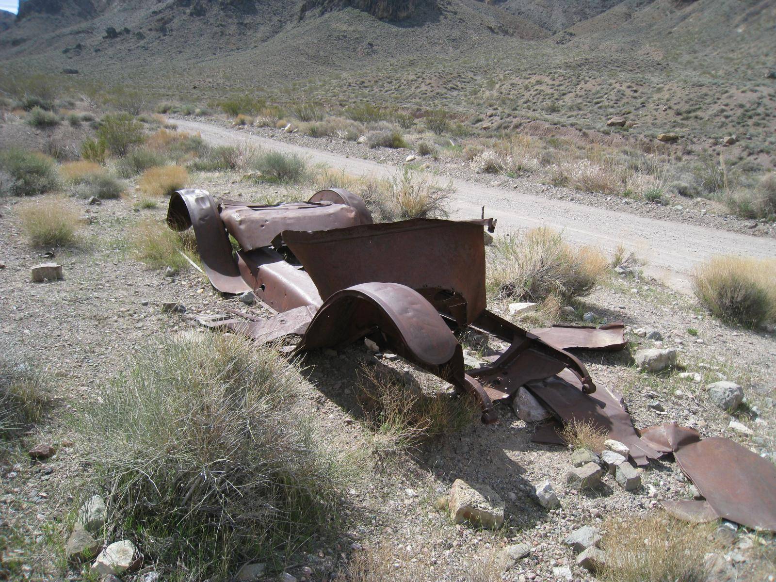 Rusting vehicle in the ghost town of Leadfield, Death Valley National Park, California