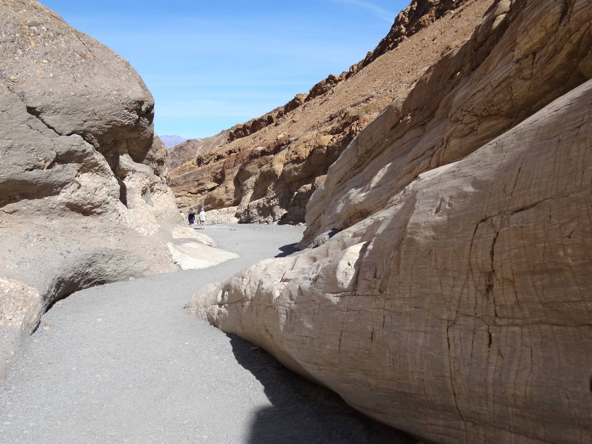 Bulging cliff walls of brown and red